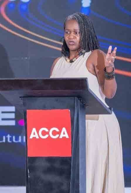 Clara speaking from an ACCA podium.